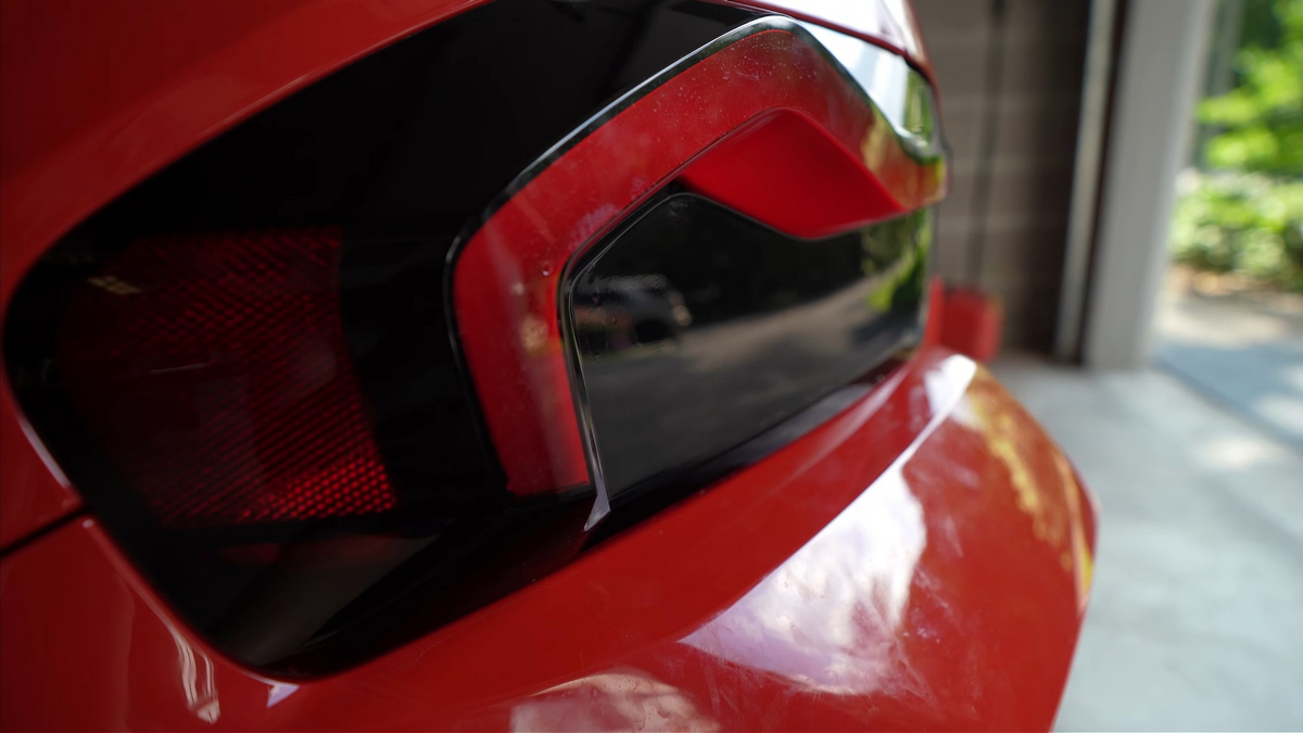 Close up of the BMW M2 G87 model fitted with the Reverse Light Tint in Dark.