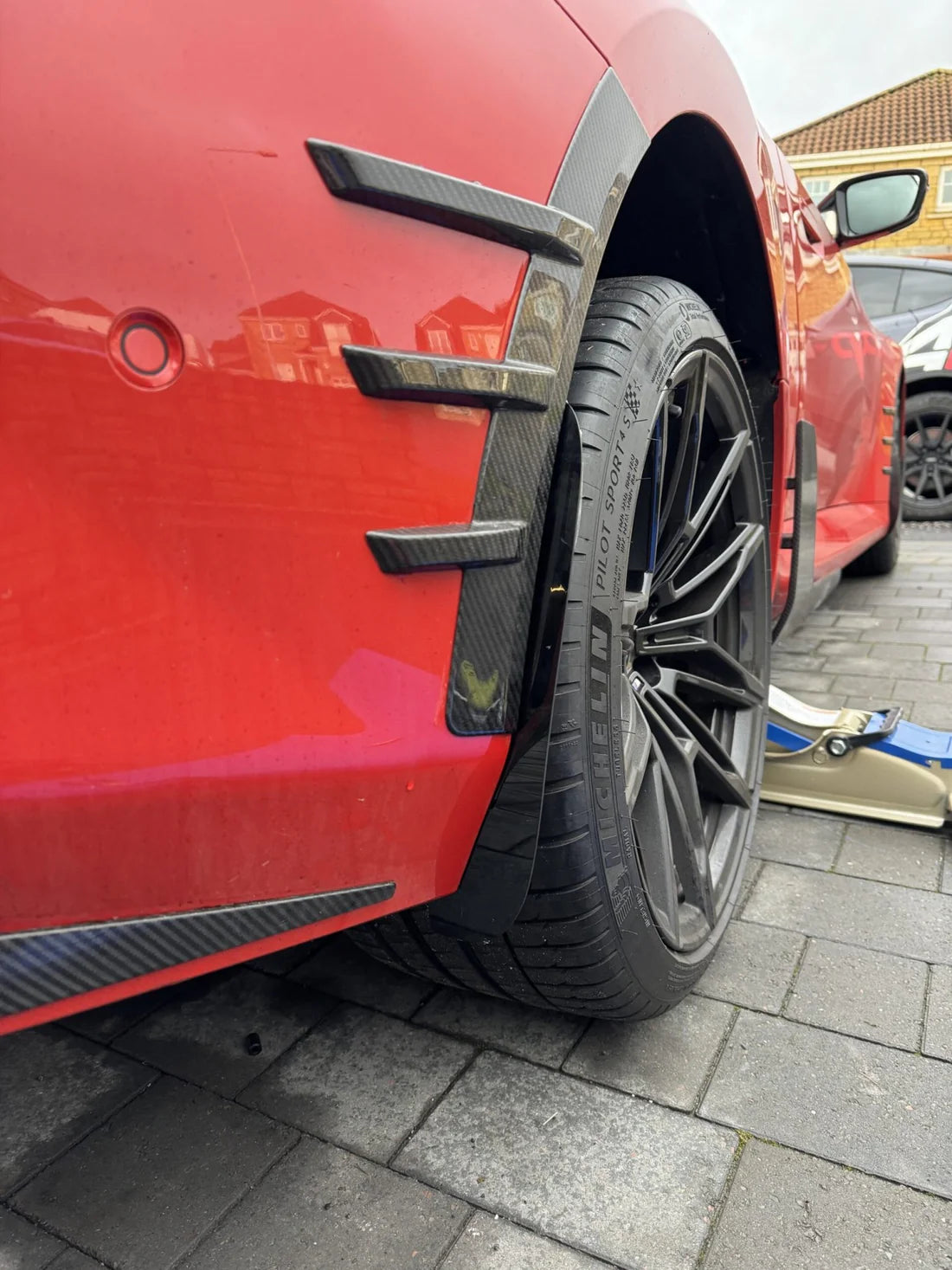 G87 M2 arch guards installed to the car, protecting against road damage.
