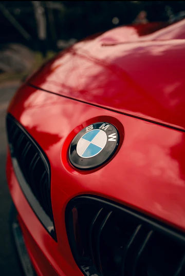 BMW F Series Dechromed Gloss Black Badges Roundels fitted to Red BMW M3.