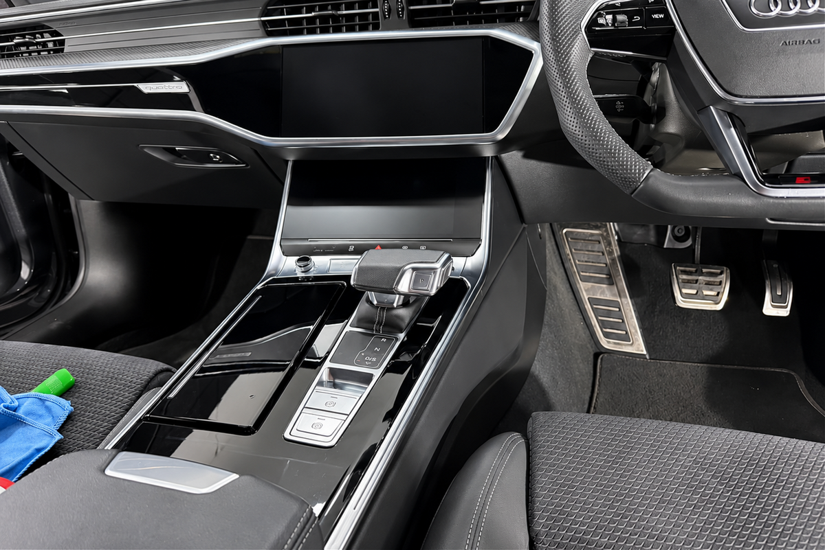 Audi A7 C8, S7 C8 & RS7 C8 pre-cut interior PPF wrap kit protecting the piano black center console from scratches, fingerprints and dust.