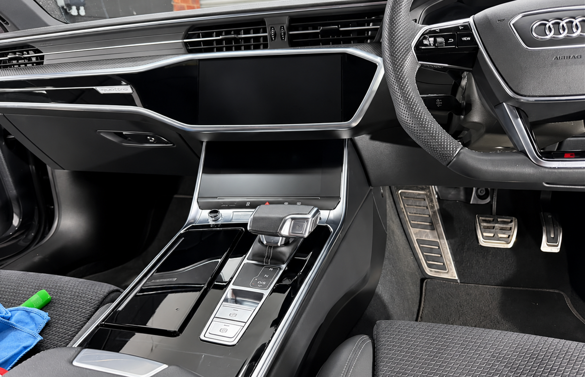 Audi A7 C8, S7 C8 & RS7 C8 matte screen protectors installed, stopping sun glare, fingerprints and scratches. The clarity of the display remains unchanged. The image also captures PPF installed to the high gloss black interior trim, protecting the delicate surfaces.