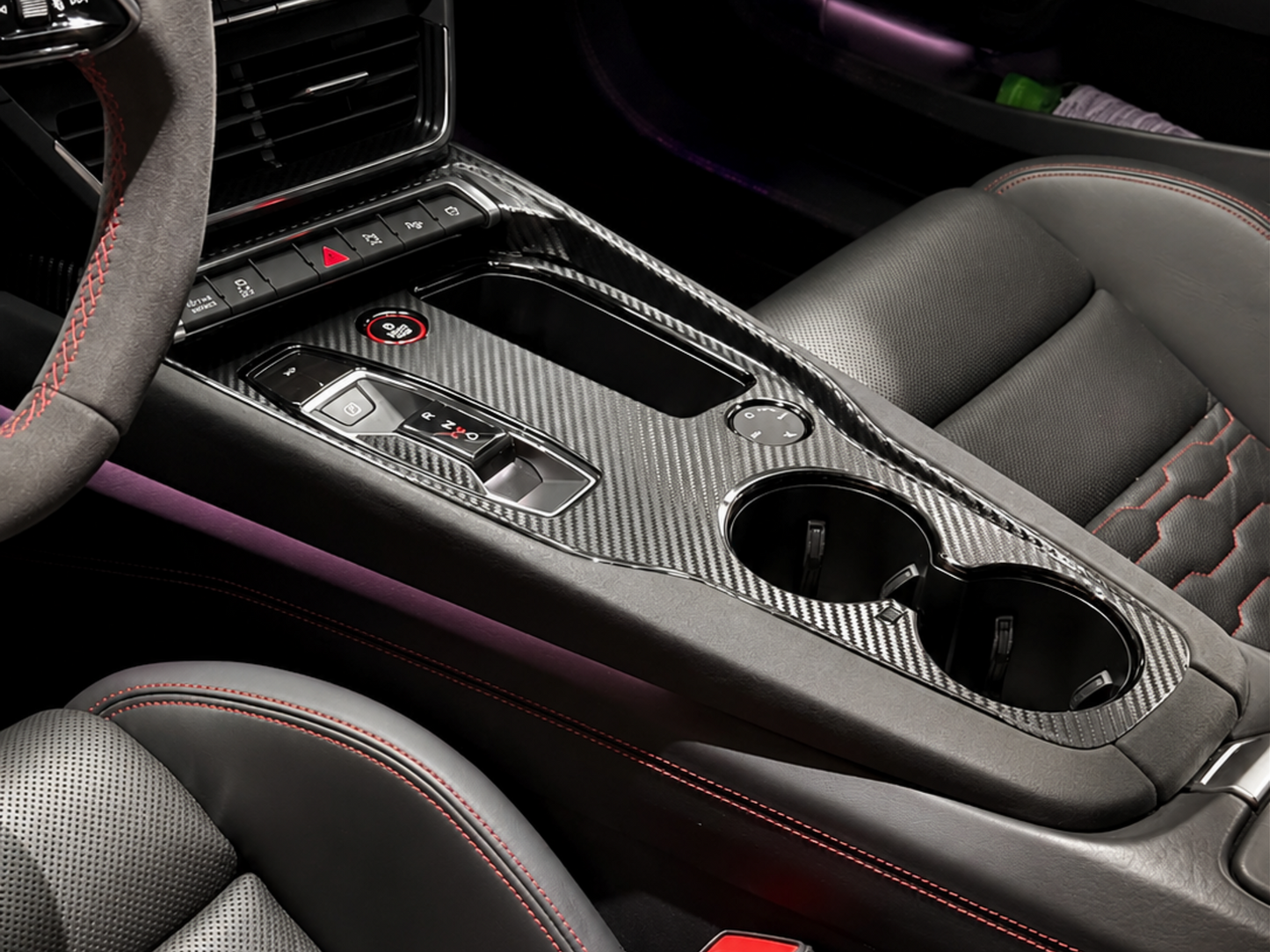 Audi E-Tron GT and Audi RS E-Tron interior center console protected with pre-cut carbon fiber PPF, stopping scratches, fingerprints and dust on the piano black trim.
