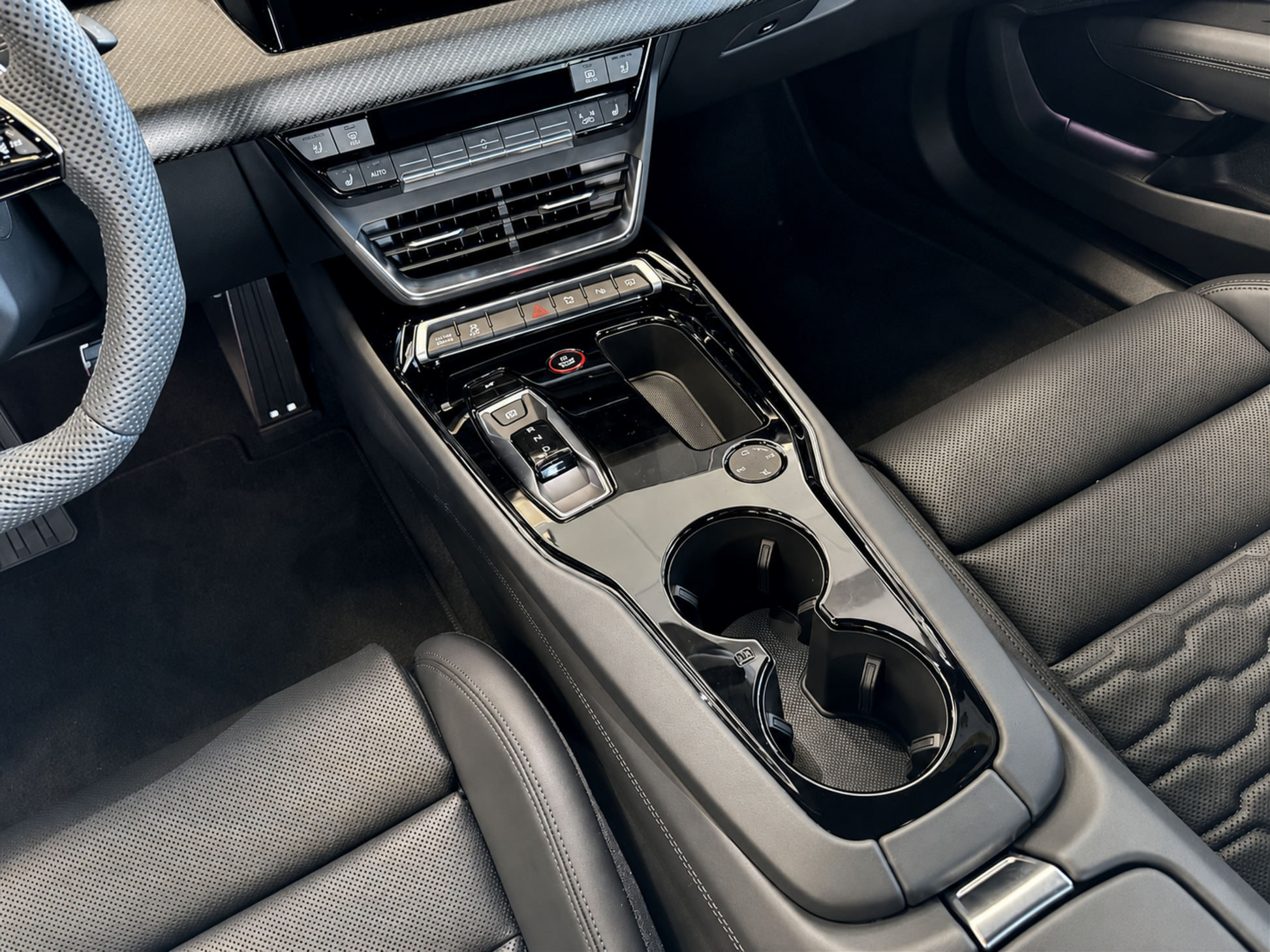 Audi E-Tron GT and Audi RS E-Tron interior center console protected with pre-cut self healing gloss PPF, preventing scratches, fingerprints and dust on the gloss piano black trim.