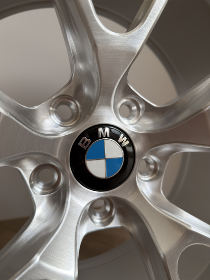 BMW Dechromed Gloss Black Wheel Centre Caps fitted to Silver Wheel. 