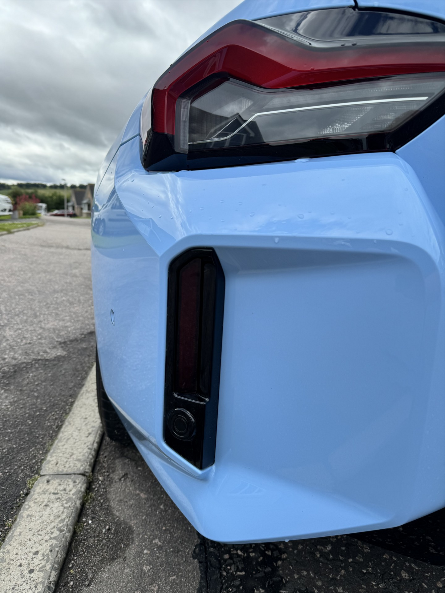 Close up of the Blue BMW G87 M2 fitted with the Reflector Tint in Dark.