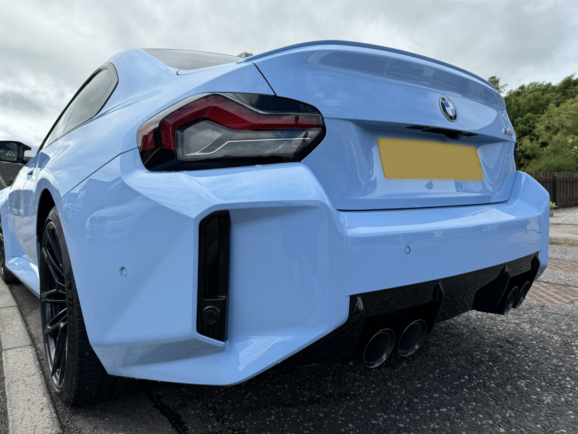 Blue BMW G87 M2 fitted with the Reflector Tint in Dark.