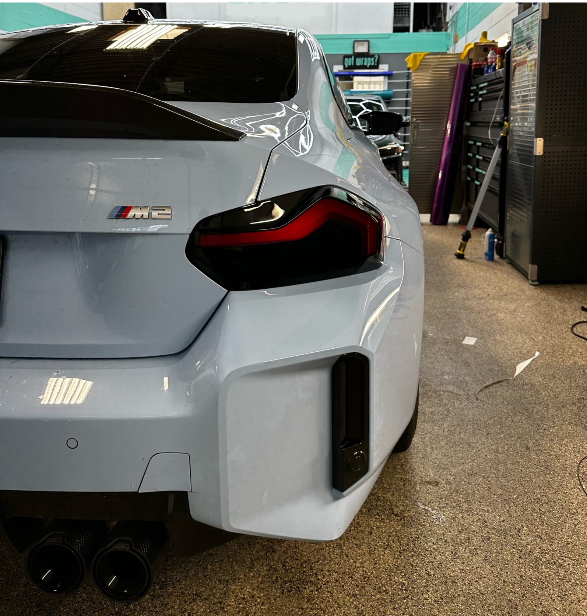 Alternate close up of the Blue BMW G87  M2 model fitted with the Reflector and Reverse Light Tints in Dark.