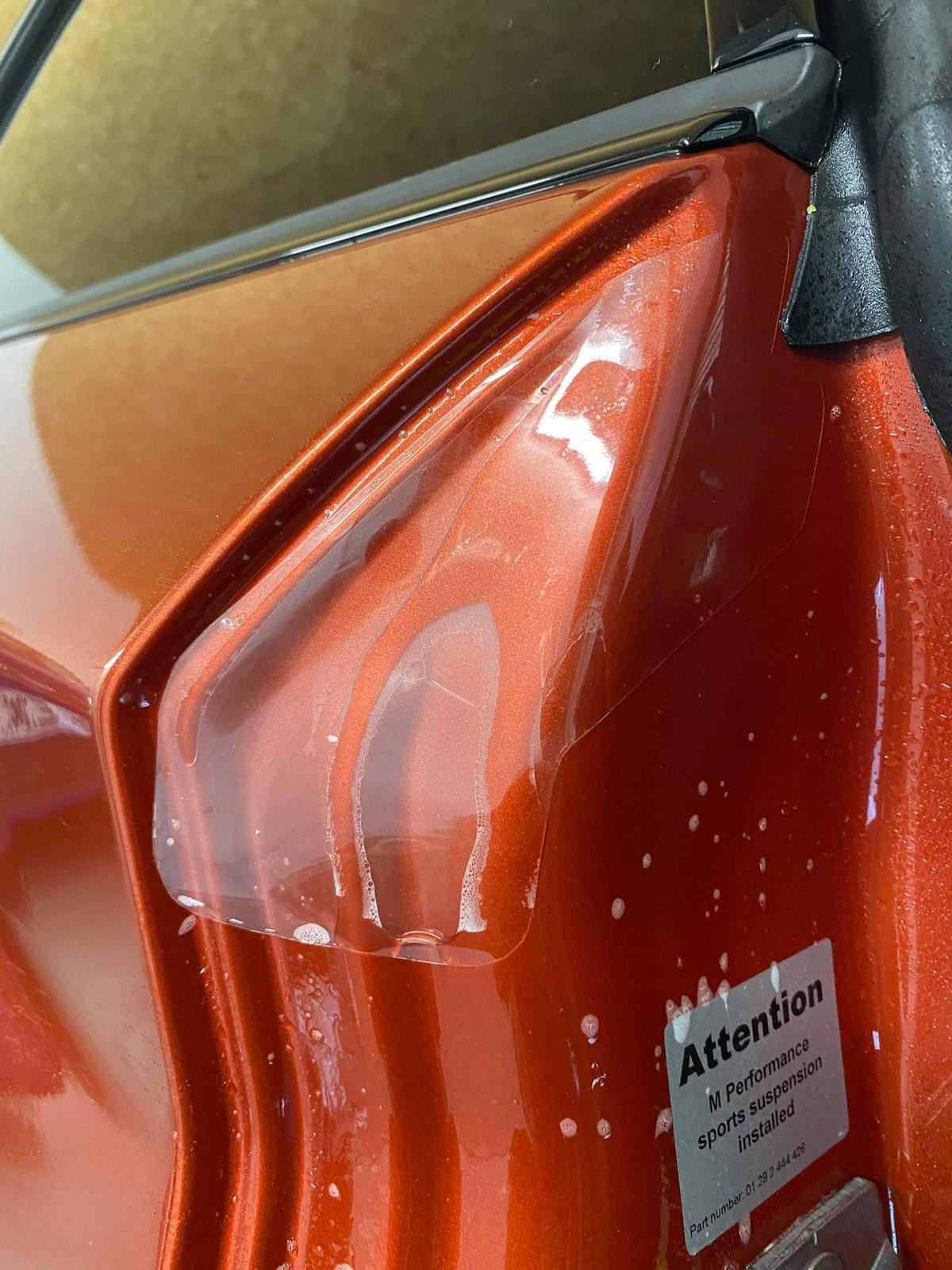 Application of PPF to the Door Shut of a BMW 2 Series M2 F87 model. 