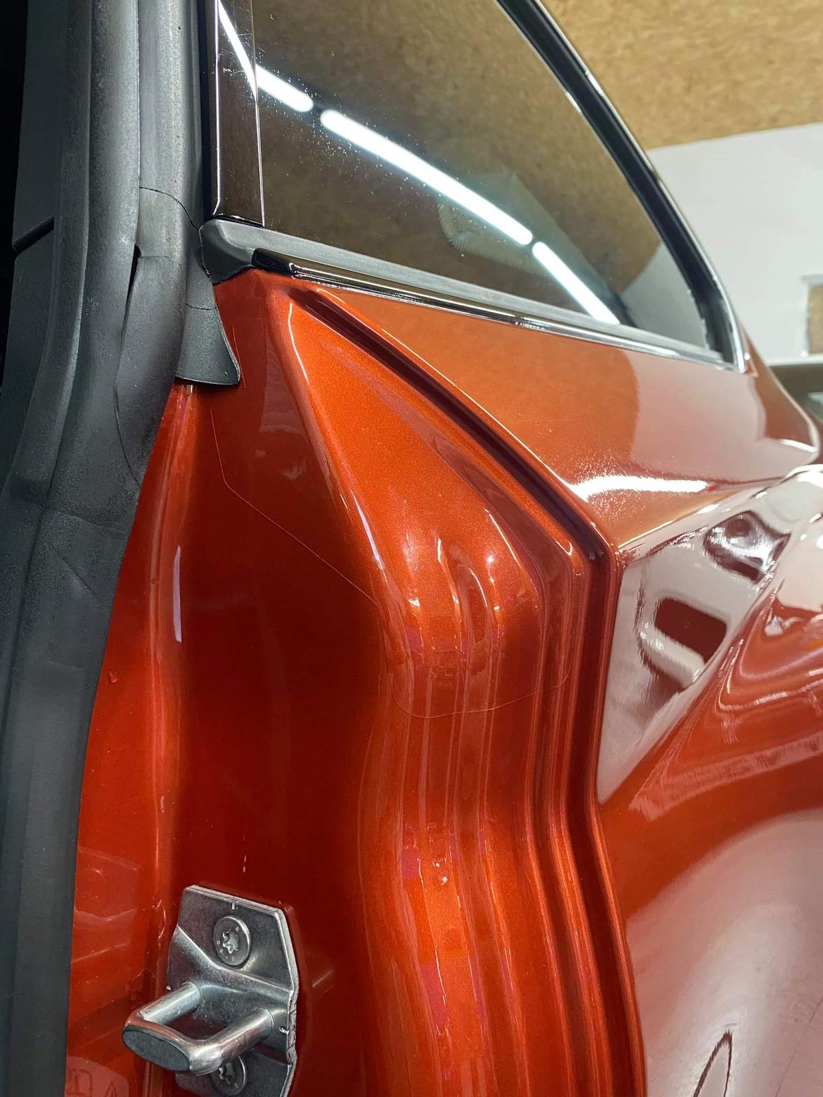 BMW M2 F87 in Orange with applied PPF Door Shut Protection Kit in Gloss Transparent with self healing properties. 