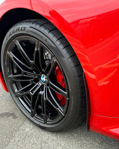 BMW M2 G87 front guards finished in carbon fibre, protecting the paintwork ad rear arches from stone chips, and road debris.