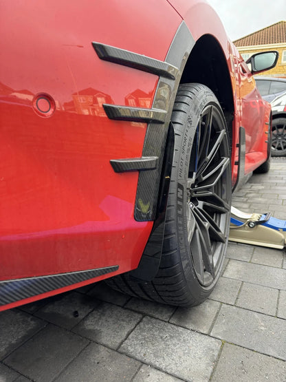 G87 M2 arch guards installed to the car, protecting against road damage.