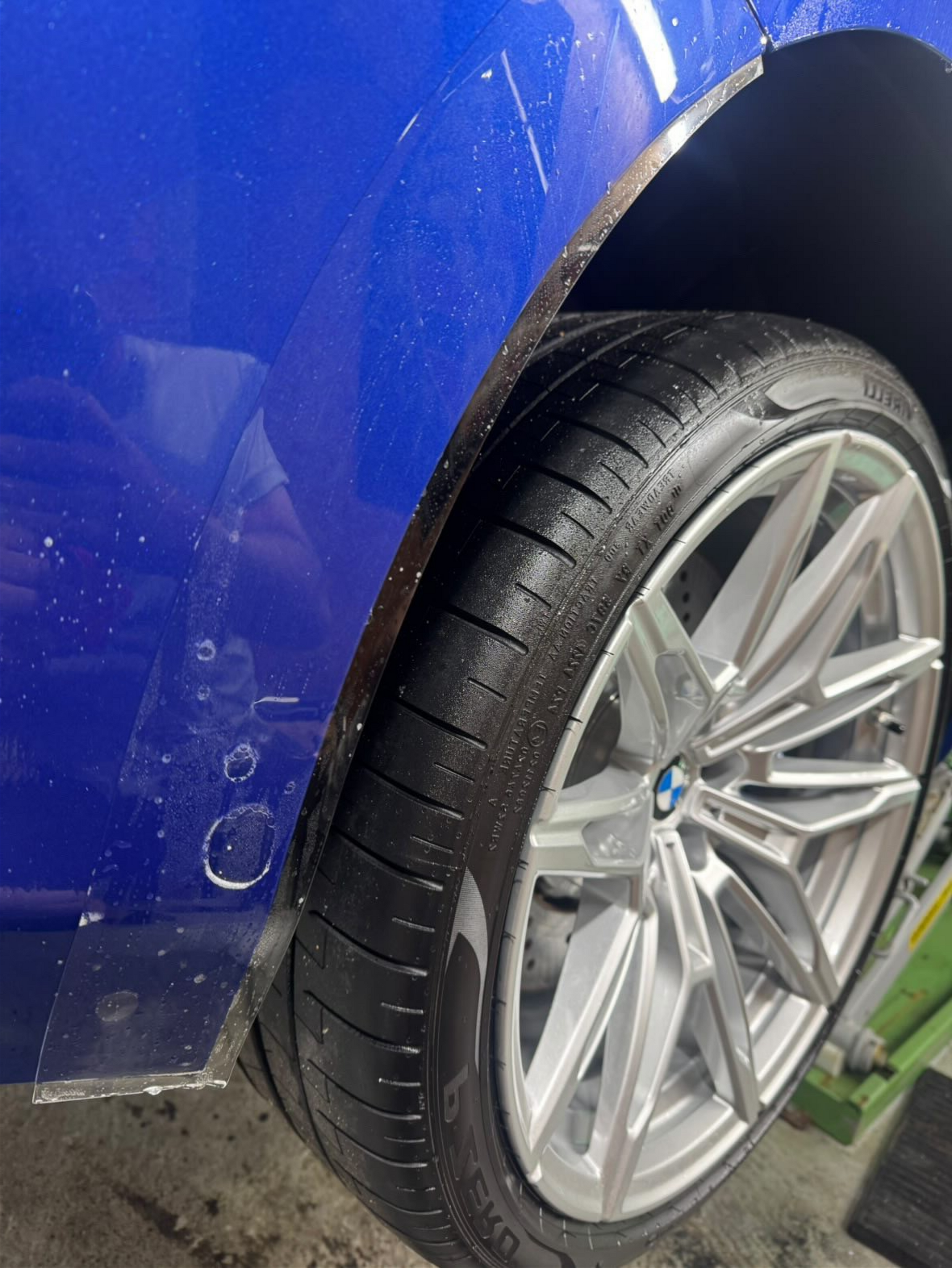 BMW M2 G87 Rear Wheel Bumper Arch Paint Protection Kit during installation. 