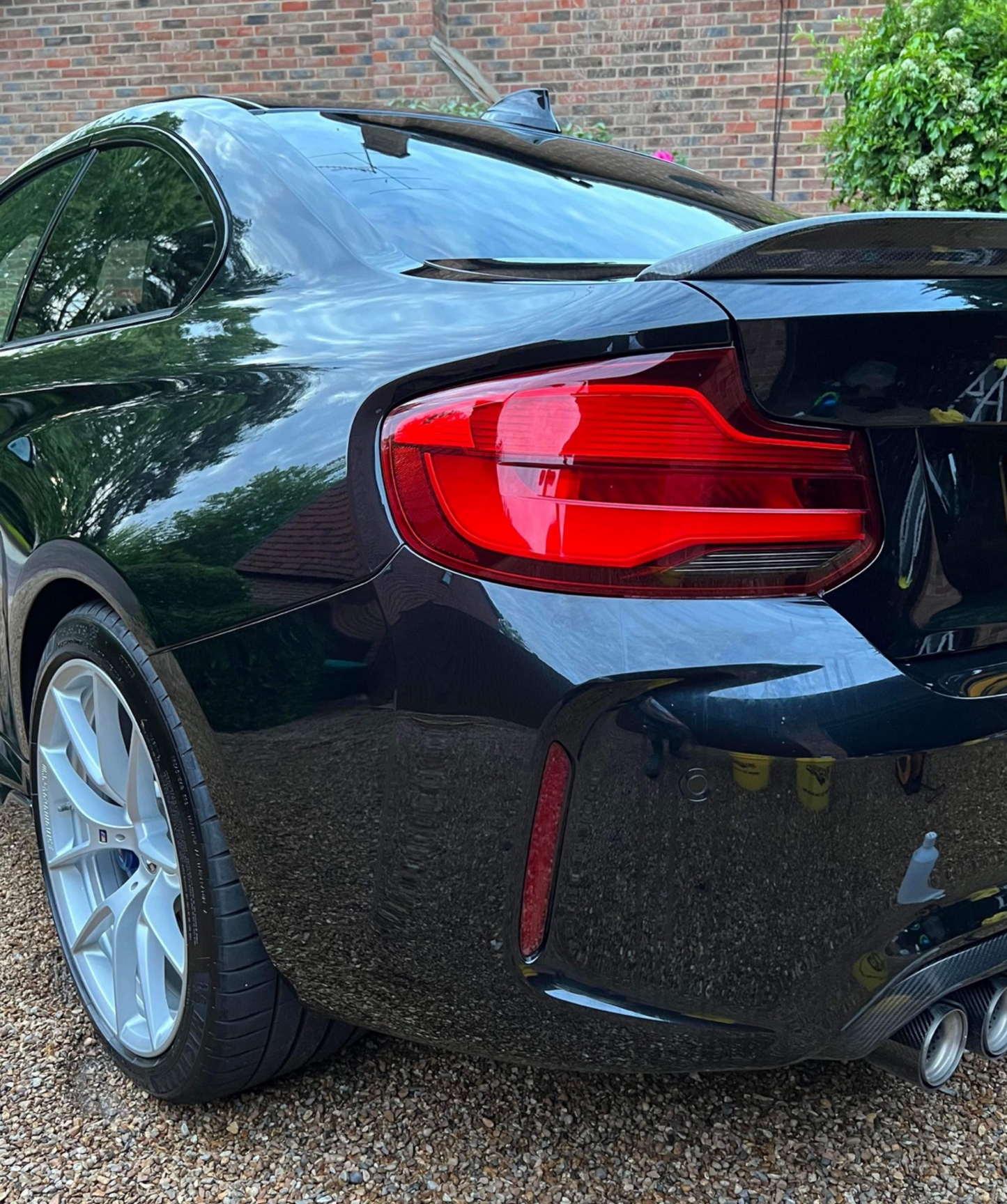 Black BMW M2 M2C F87 fitted with Reflector Tint Kit in Medium. 