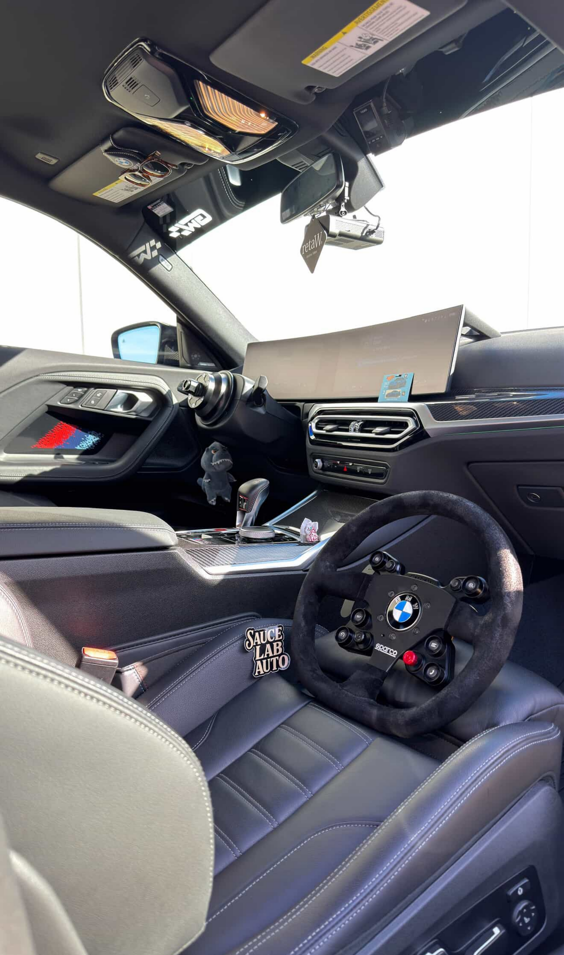 Full view of the BMW G87 M2 interior showcasing the iDrive 8 and iDrive 9 Instrument Cluster Navigation Screen Protection Film Kit finished in Matte.