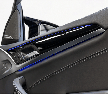 BMW X3, iX3, X3M, X4, & X4M interior PPF coverage of the door card trim, protecting against scratches, fingerprints and dust on the piano black or carbon fibre trim.