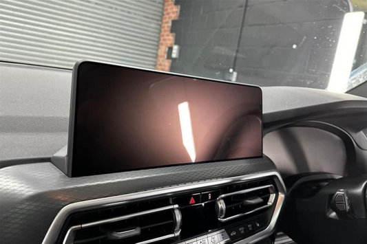 BMW X3, X4, X3M, & X4M navigation screen with gloss self healing PPF screen protector installed.