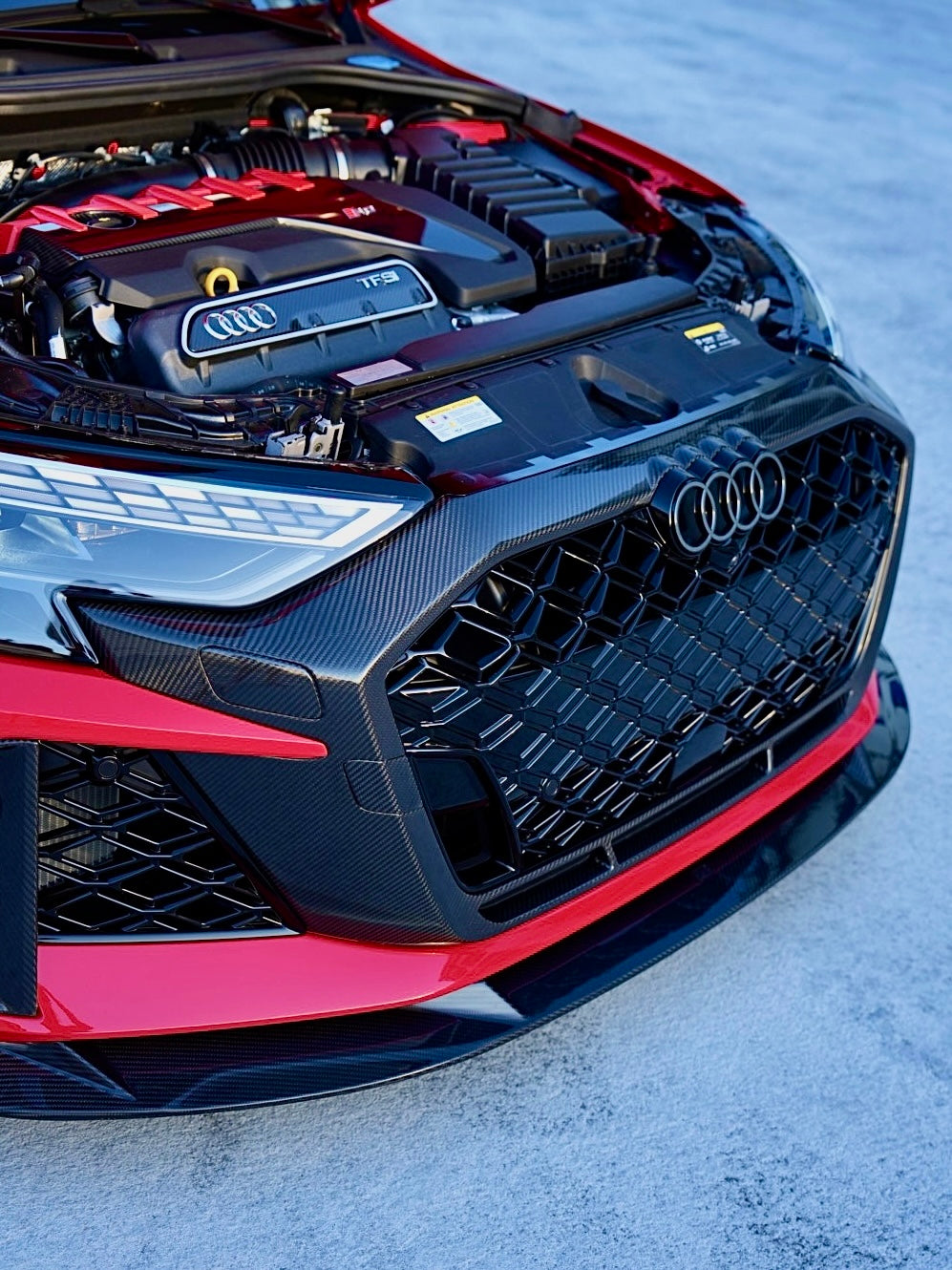Audi RS3 8.5Y with a full carbon fibre front grille replacment, demonstating OEM fitment and aggressive styling.