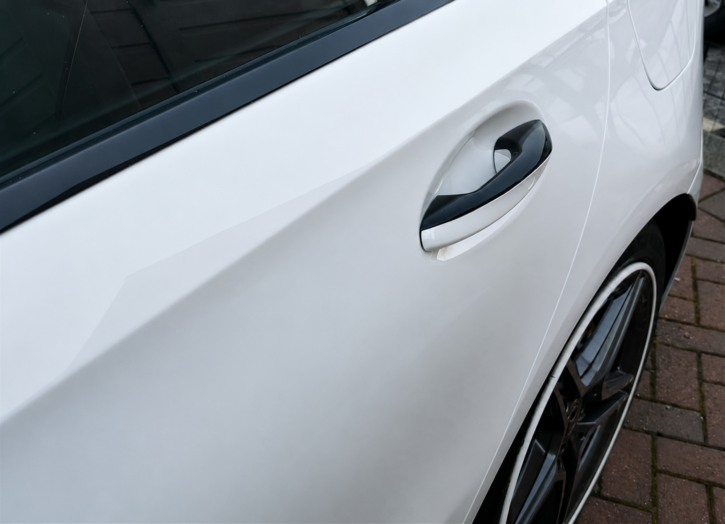 Mercedes-Benz gloss black door handle  pre cut vinyl wrap installed, hiding the chrome section of the door handle. Covers fitment on the A Class, A35, A45, C Class, C63, C43, GLA Class, CLA Class, CLA34, CLA45, GLC Class, GLE Class, GLS Class, EQC Class & GLB Class.