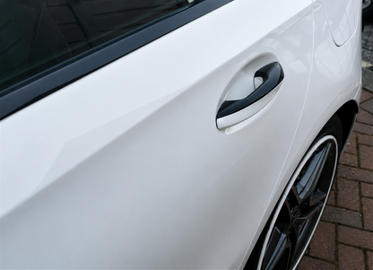 Mercedes-Benz gloss black door handle  pre cut vinyl wrap installed, hiding the chrome section of the door handle. Covers fitment on the A Class, A35, A45, C Class, C63, C43, GLA Class, CLA Class, CLA34, CLA45, GLC Class, GLE Class, GLS Class, EQC Class & GLB Class.