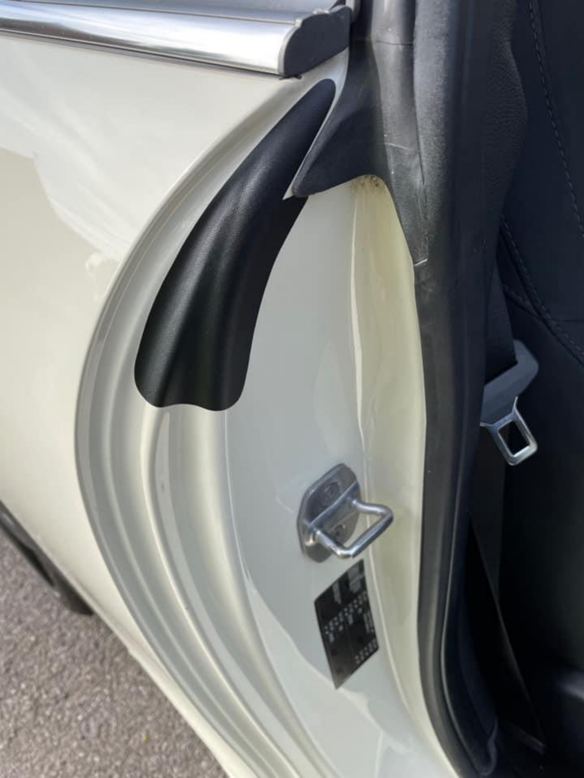 Installed Textured Black Door Shut Jamb Paint Protection Film Kit for the MINI Cooper.