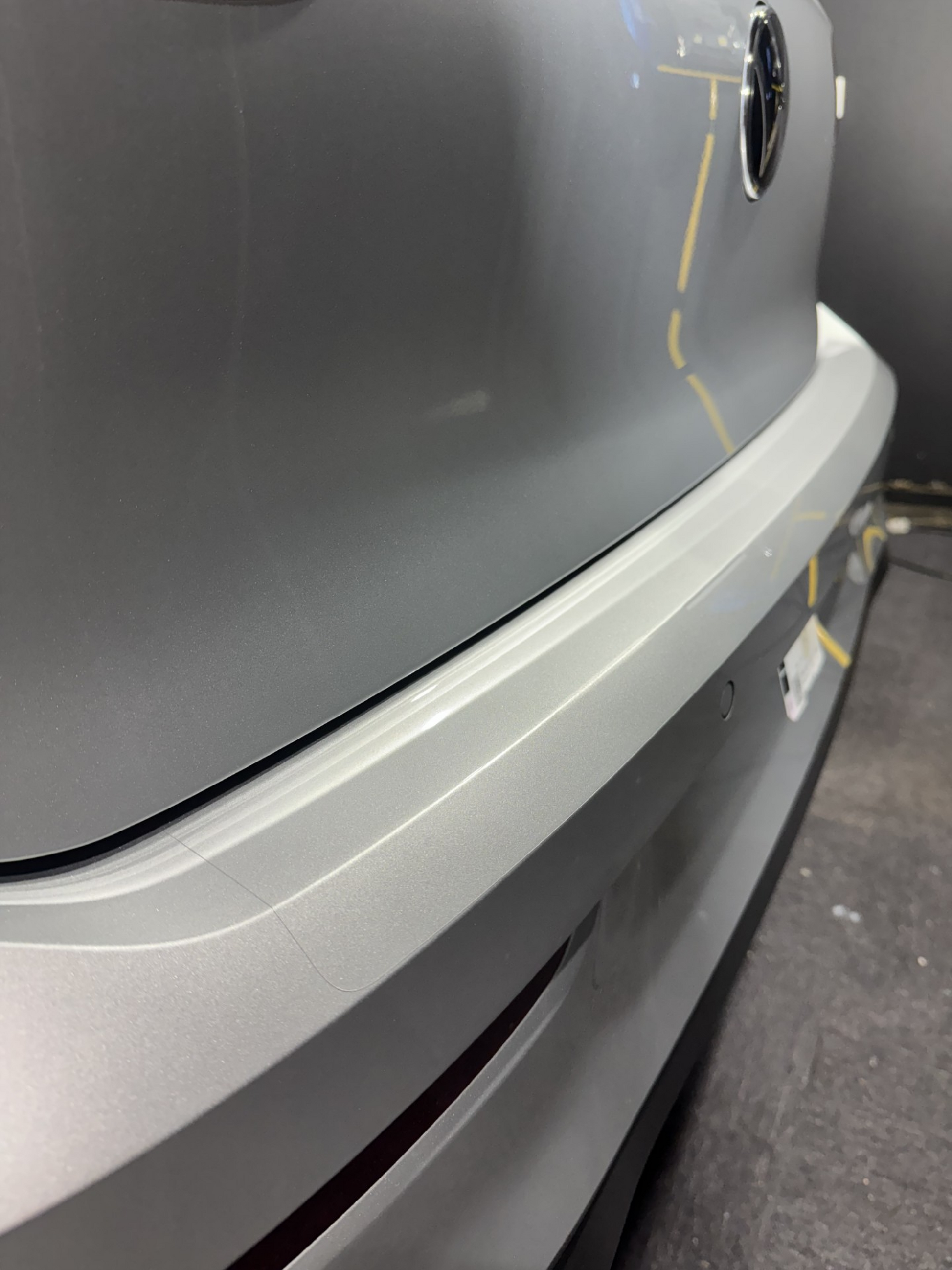 VW Golf MK8 GTI boot trunk bumper lip paint protection film kit installed.