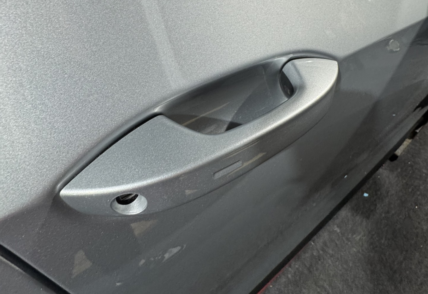 VW Golf MK8 and MK8.5 pre cut door handle cup ppf kit installed on a silver GTI.