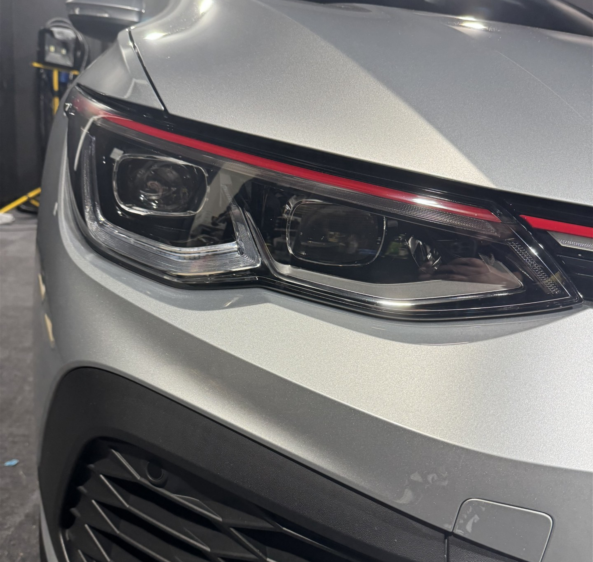 VW Golf MK8.5 pre cut headlight ppf kit installed on a GTI demonstrating the coverage area.